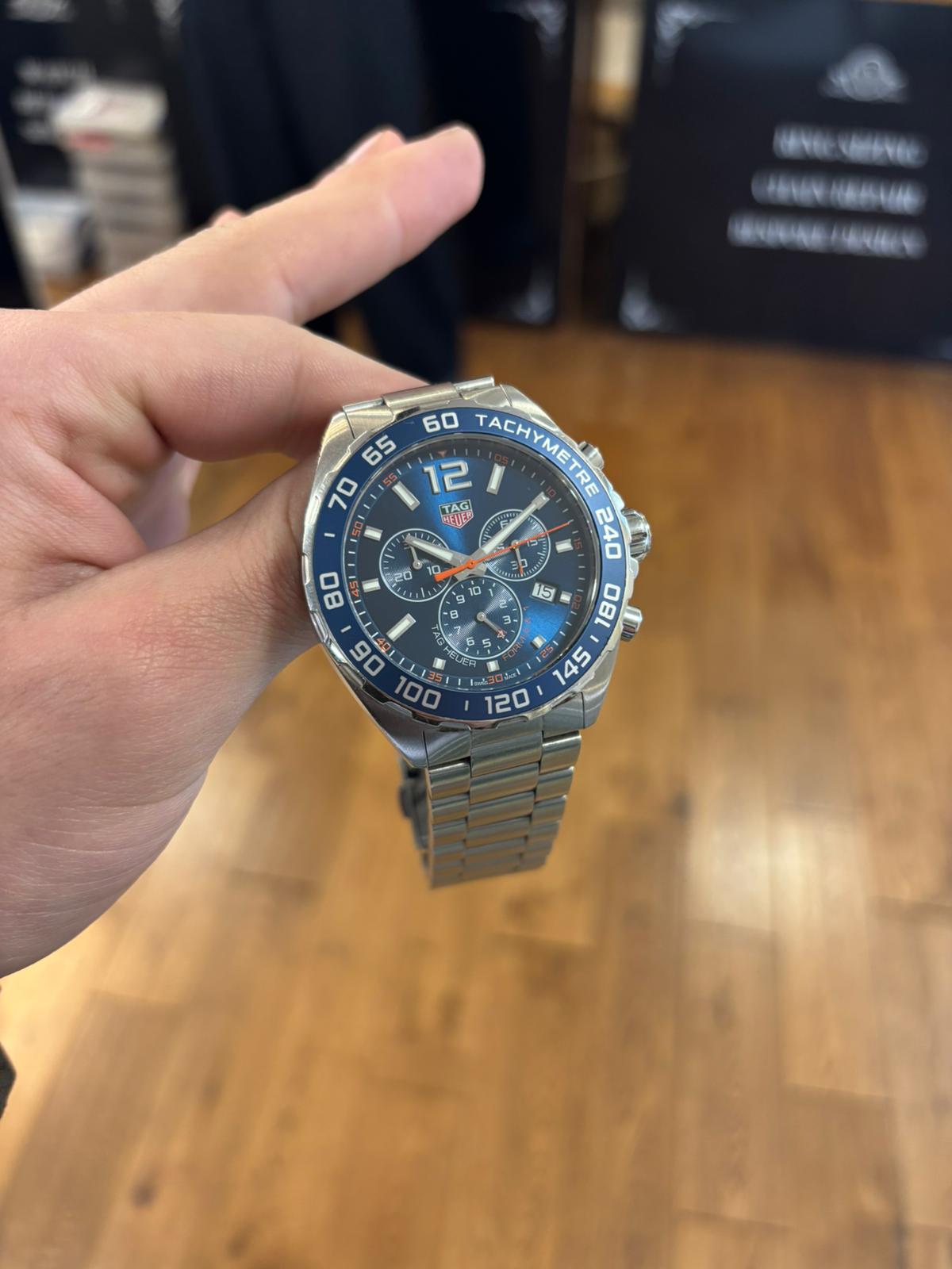 Omega Planet Ocean orange bezel in hand